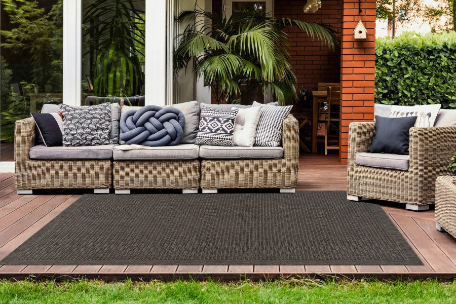 brown outdoor rug with patio set