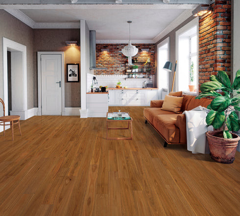 Lounge with a tan leather sofa on a deep reddish orange-brown timber floor