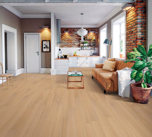 Lounge with a tan leather sofa on a pale pinkish blonde timber floor