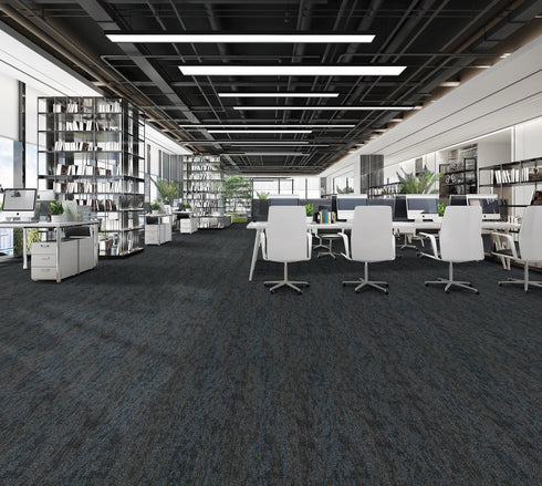 Office floor of charcoal carpet plank tiles with blue accent threads