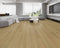 Lounge room laid with light sandy oak vinyl plank flooring