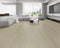 Lounge room laid with pale grey-beige whitewashed vinyl plank flooring