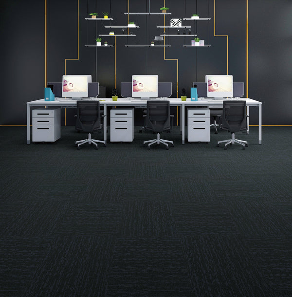 Office laid with very dark teal cast cushion-backed carpet tiles