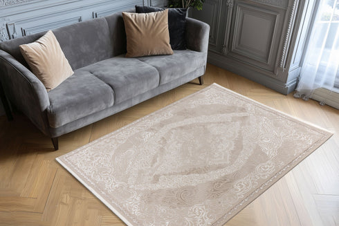 Elegant area rug featuring symmetrical medallion and intricate border detailing