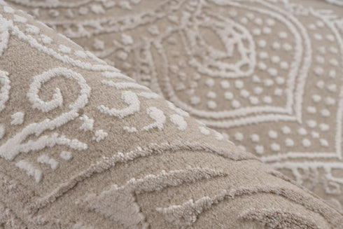 Ornate patterned rug with vintage-inspired medallion and refined white accents