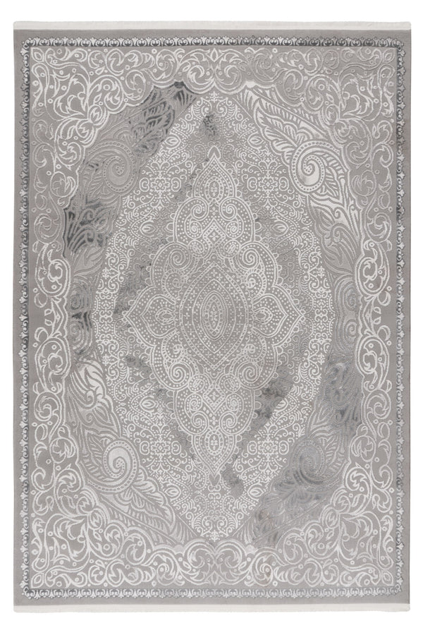 Gray and white rug with central medallion and intricate paisley floral pattern