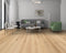 Lounge with a grey sofa and green chair on a pale warm blonde oak floor