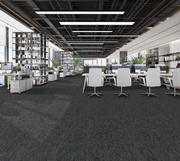 Office floor of charcoal carpet plank tiles with lighter grey threads