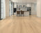 Kitchen with a pale golden beige laminate plank floor