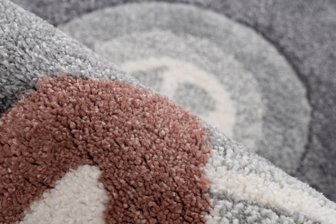 Soft children’s rug with playful heart accents and butterfly motif