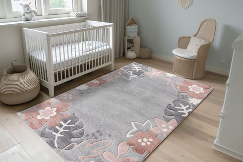 High pile rug featuring decorative flower and leaf edge design