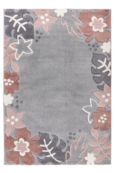 Kids rug with pink and white floral border on grey background
