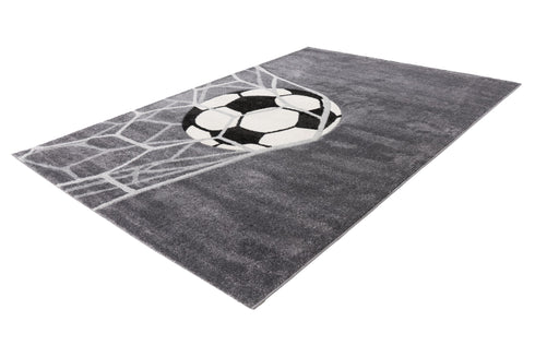 Plush children’s rug with sporty soccer motif