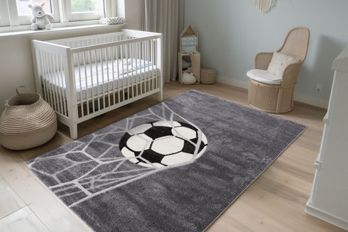 High pile rug featuring dynamic soccer-themed design