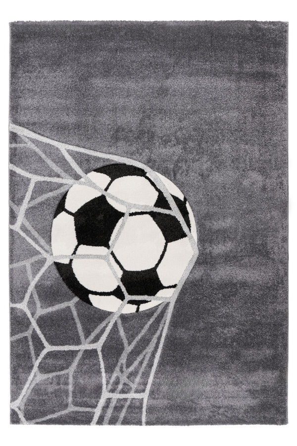 Kids rug with soccer ball hitting the net on grey background