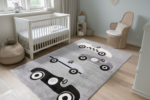 Kids rug with race cars on grey background