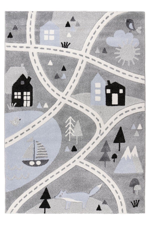 Kids rug with illustrated houses, trees, animals, and sailboat