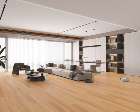 Open-plan lounge with a light warm pinkish tan laminate plank floor