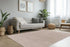 Neutral-toned rug featuring subtle linear pattern and plush surface