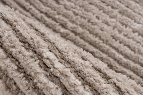 high pile beige rug with minimalist horizontal line design