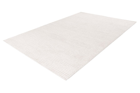 Textured ivory rug with gentle stripe detailing and luxurious feel