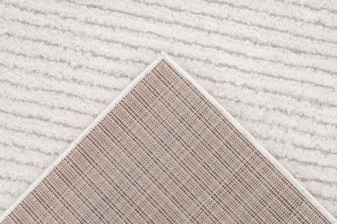 High pile area rug in ivory with minimalist horizontal design