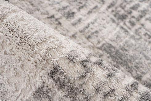 Contemporary square rug with artistic grey and white texture