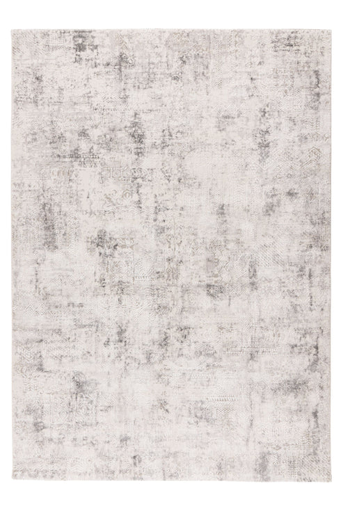 abstract area rug with distressed grey and off-white pattern