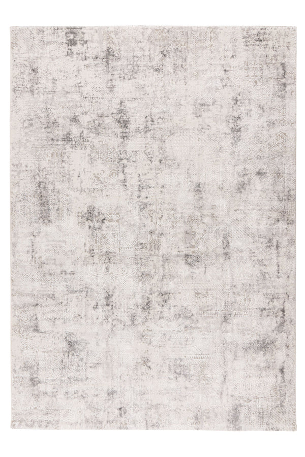 abstract area rug with distressed grey and off-white pattern