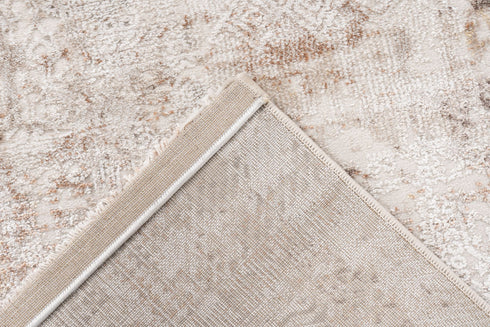 area rug with aged appearance and subtle ornamental pattern