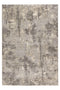 Abstract area rug with distressed stone-like pattern in grey and beige
