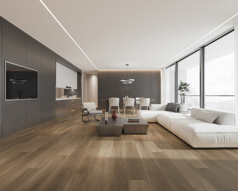 A mid grey-brown hybrid plank floor with a smoky taupe cast in an apartment lounge