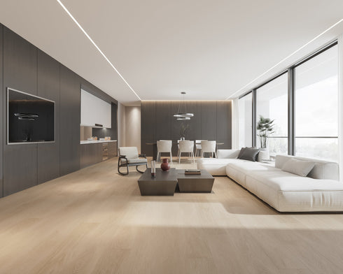 A pale pinkish beige hybrid plank floor in an apartment lounge