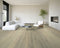 Pale beige oak floor with a slight grey cast in a room with a fireplace