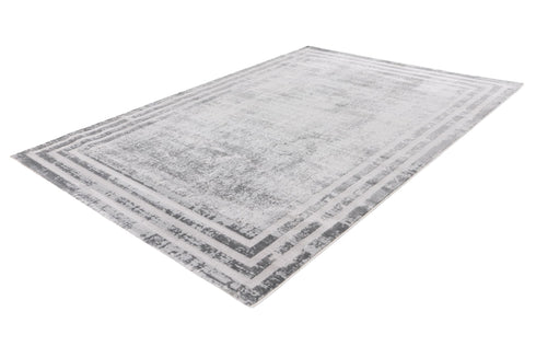 Neutral grey rug with subtle texture and vintage charm