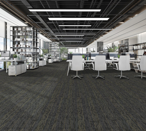 Office floor of charcoal carpet plank tiles with yellow-olive gold accent threads