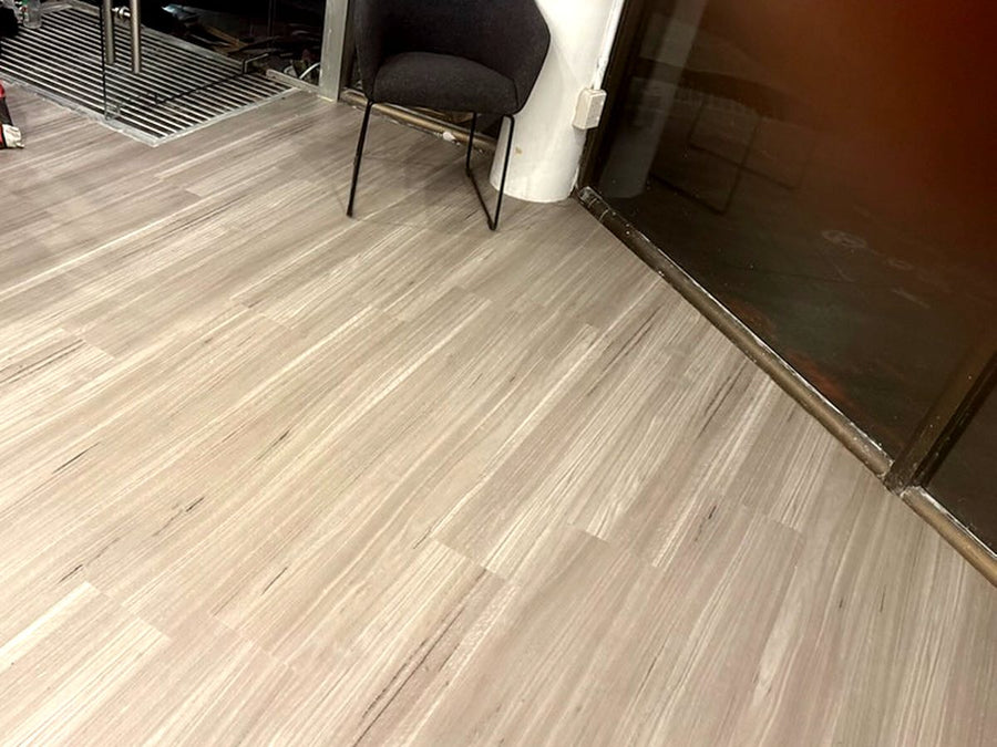 Commercial vinyl flooring laid by Adore