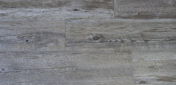 Ornato Morlaix 5.3mm looselay vinyl plank swatch in weathered driftwood grey oak with open knots and rustic grain