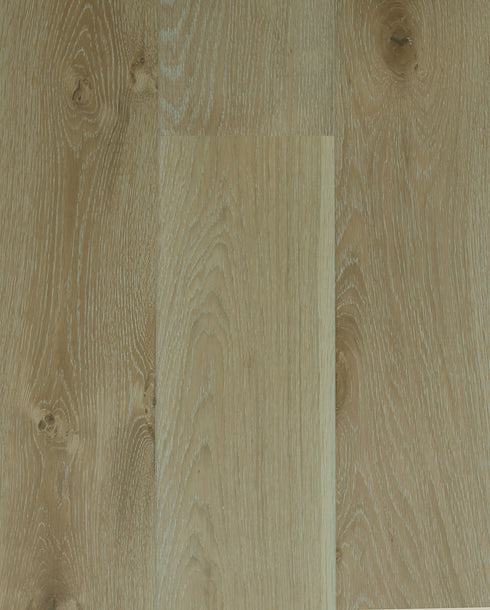 Swish Oak Wideboard Urban Limewash Oak engineered oak flooring swatch showing warm honey-tan boards alongside one pale cream board with a soft golden-beige cast