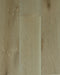 Swish Oak Wideboard Urban Limewash Oak engineered oak flooring swatch showing warm honey-tan boards alongside one pale cream board with a soft golden-beige cast