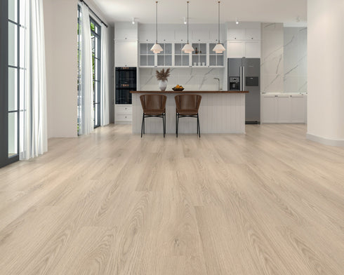 Kitchen with a pale whitewashed greige laminate plank floor