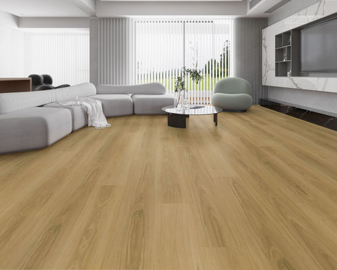 Lounge room laid with light to mid golden oak vinyl plank flooring