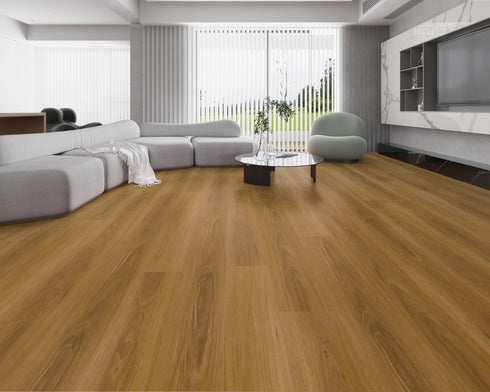 Lounge room laid with mid amber brown vinyl plank flooring