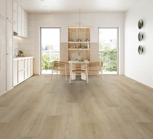 A light greige hybrid plank floor with a sandy tone in a dining room with timber chairs