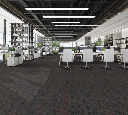 Office floor of charcoal carpet plank tiles with dark red accent threads