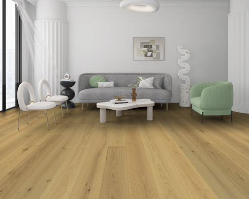 Lounge with a grey sofa and green chair on a golden honey oak floor with knots