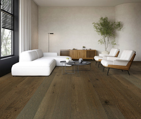 Dark smoked brown oak floor with knots beneath a white sofa in a living room