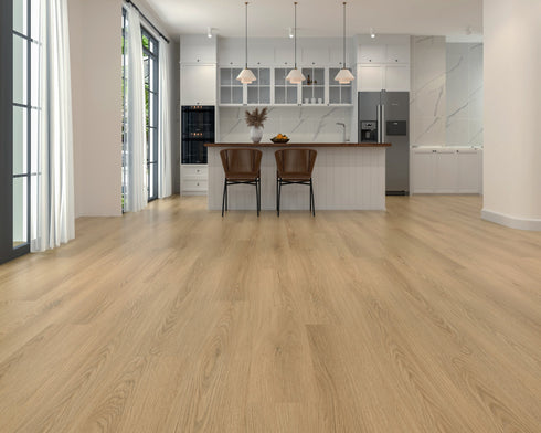 Kitchen with a light to mid beige laminate plank floor