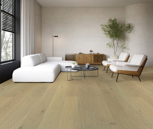 Living room with a white sofa on a sandy beige oak floor with a soft greige tan tone