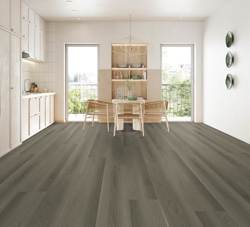 A mid to dark charcoal-grey hybrid plank floor in a dining room with timber chairs